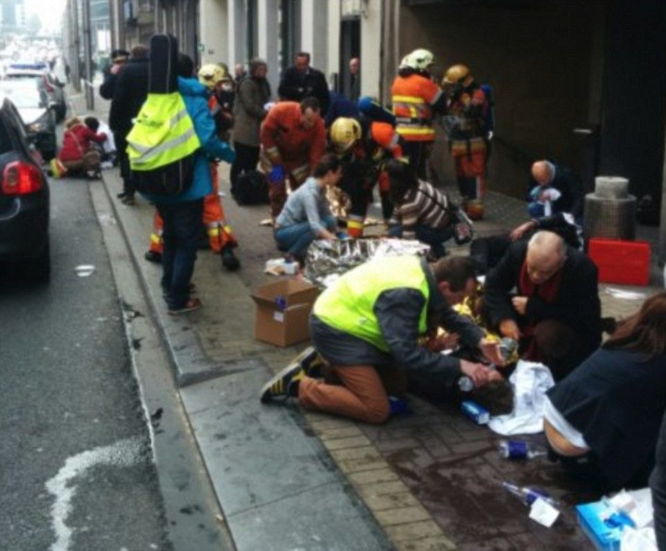 3272CE8400000578-3503928-Bravery_People_are_treated_comforted_and_given_water_by_the_emer-m-7_1458639870116